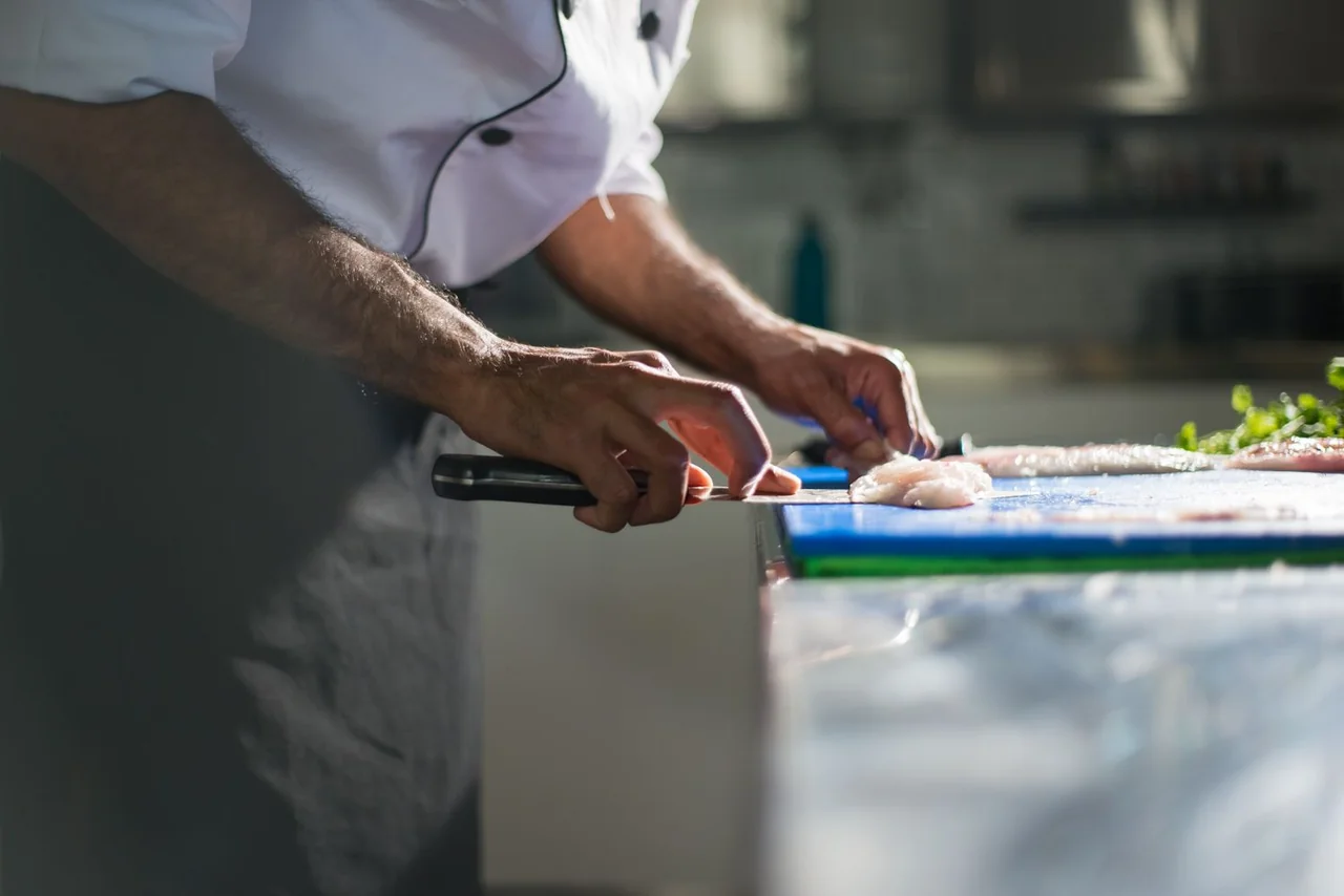 Chef Slicing Fish